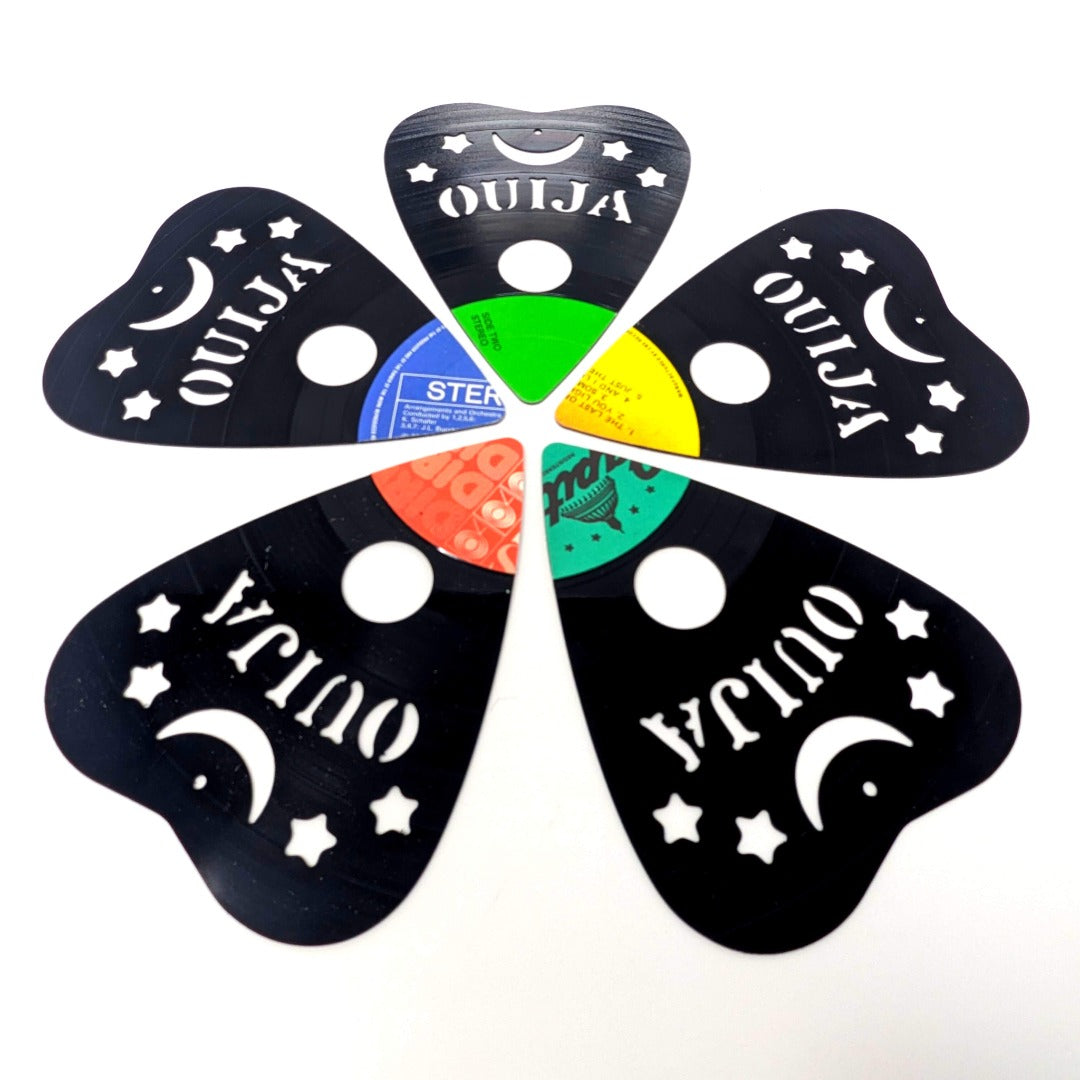 Eco-friendly table crafted from unloved vinyl records and CNC Ouija pattern.
