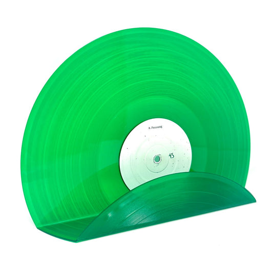 A handmade vintage green vinyl record used as decor