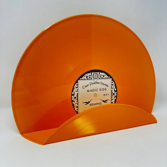 An innovative orange vinyl record used as a decor display