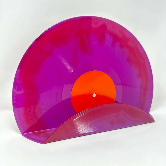 A sustainable pink vinyl record used as a decor display